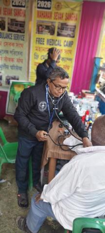 Our team Doctor examining patient at Gangasagar Mela 2026  camp